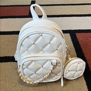 👑🪽Pocket book backpack with change purse / Claire’s